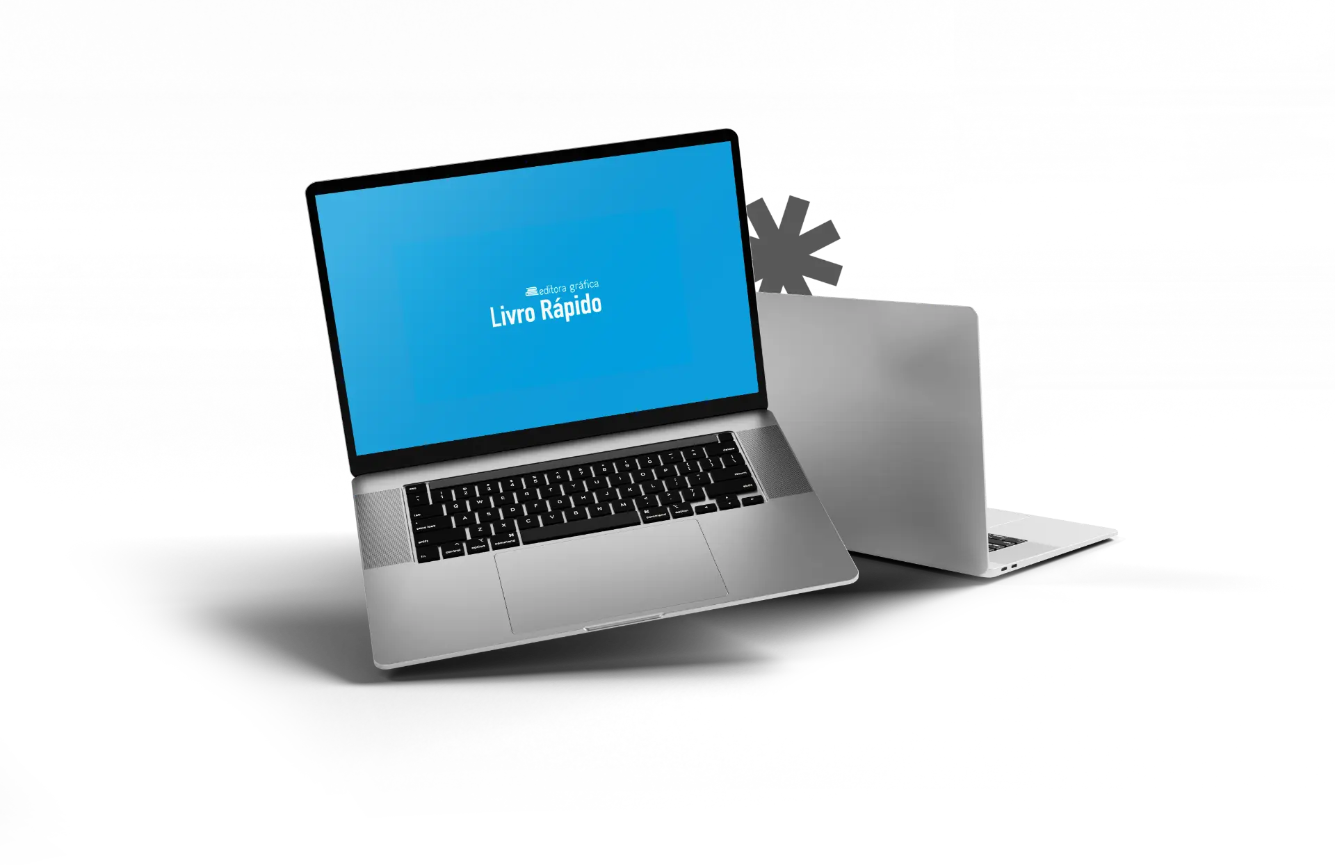 Notebooks exibindo a plataforma Livro Rápido